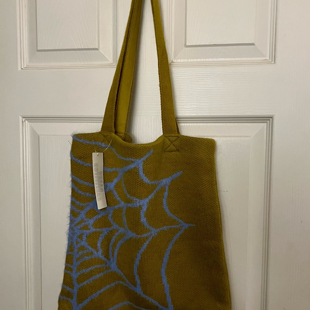 Urban Outfitters Chartreuse Green Bag with Lavender Web Design. NWT.